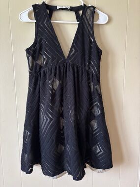 Abercrombie & Fitch Black dress with Racerback and gold underlayer. size sm/med